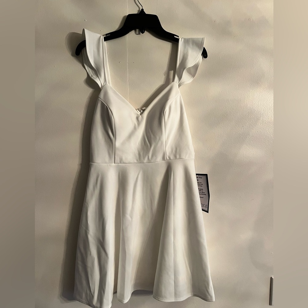 NWT from Macy’s. White short dress. Size 11